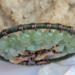 top of tree displays a row of 8mm light green glass beads